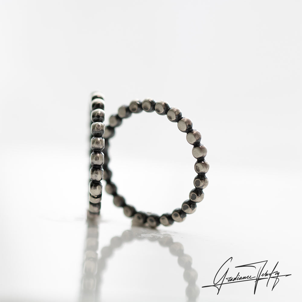 Gradiance Jewelry women's oxidized silver flat beaded Spoked Out stacker band from the Little Black Jewelry Collection - front view.