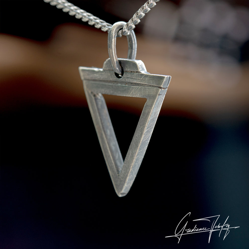 Gradiance Jewelry men's oxidized silver Descent Delta necklace from the Relic Collection featuring a triangle design -side view.