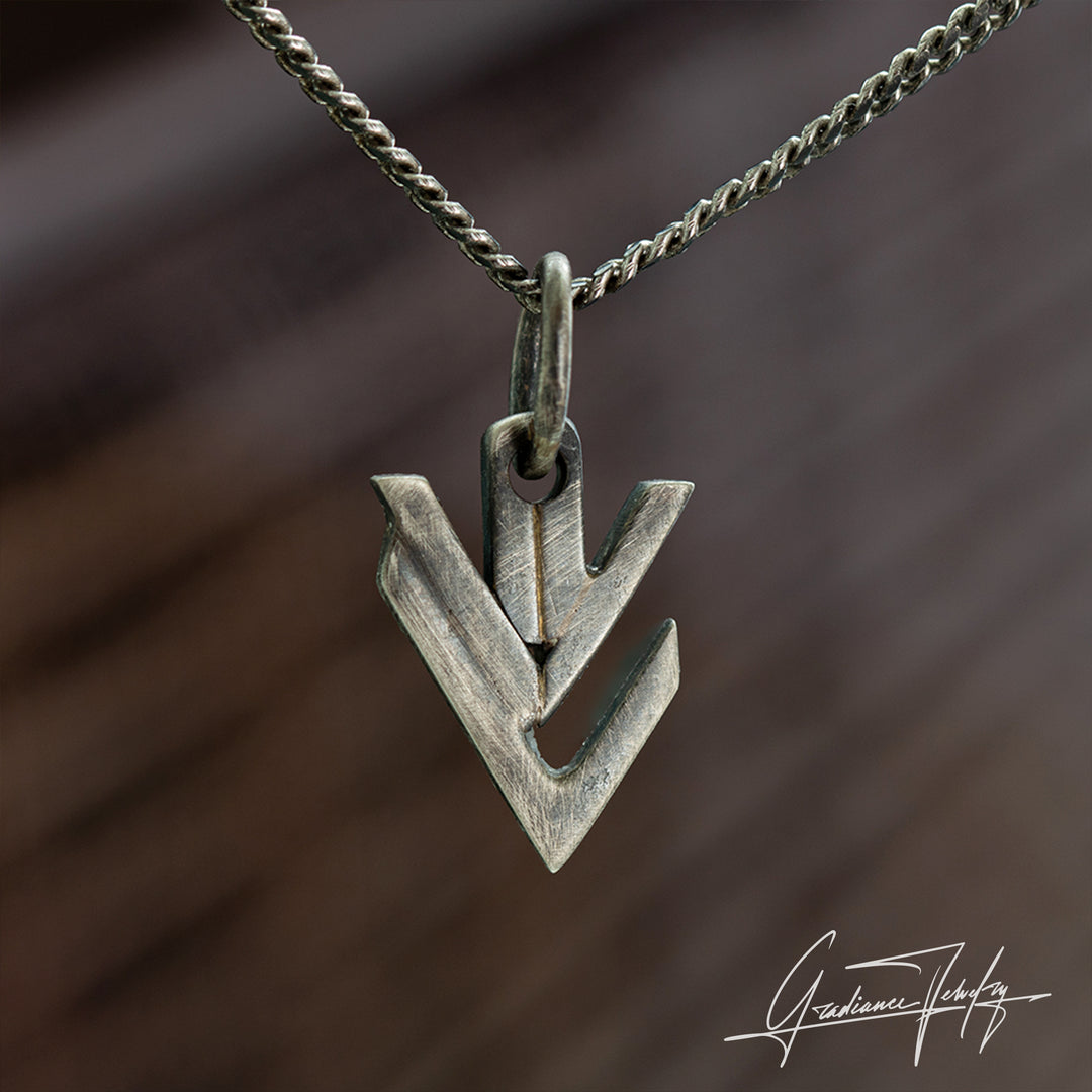 Gradiance Jewelry men's oxidized silver Downward Drift pendant featuring an arrow shaped design from our the Relic Collection - front view.