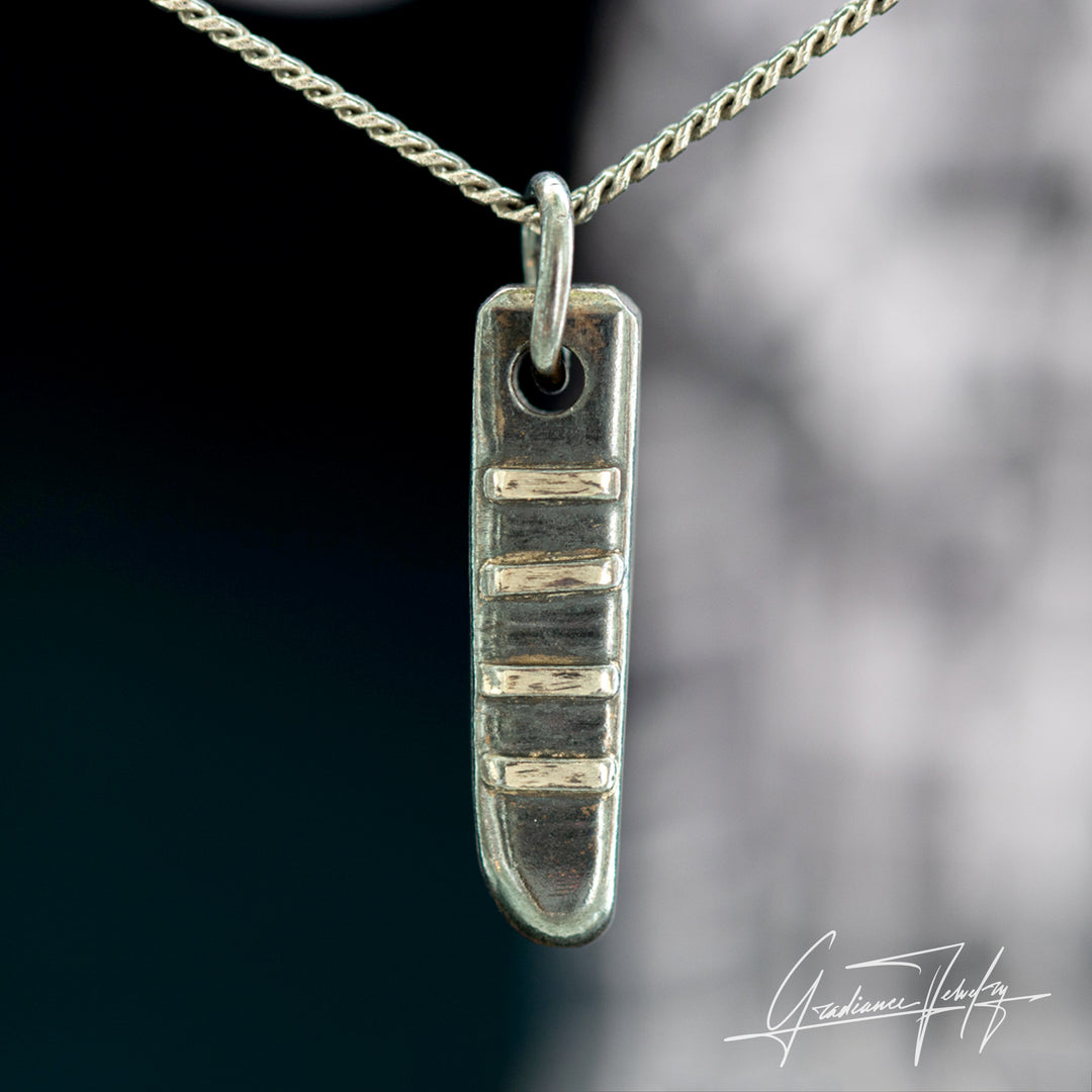 Gradiance Jewelry men's oxidized silver Fretway Pendant featuring a guitar fret design from the Relic Collection - front view.