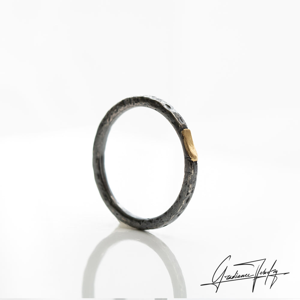 Gradiance Jewelry women's oxidized silver and 18KT yellow gold Gilded Stacking Band from our Little Black Jewelry Collection - side view.