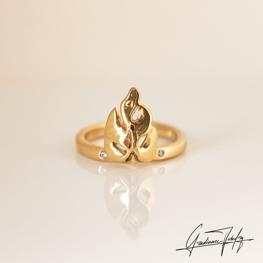 Gradiance Jewelry women's 14KT Yellow Gold Growth Ring featuring a mini monstera leaf and two small lab-created diamonds on the band.