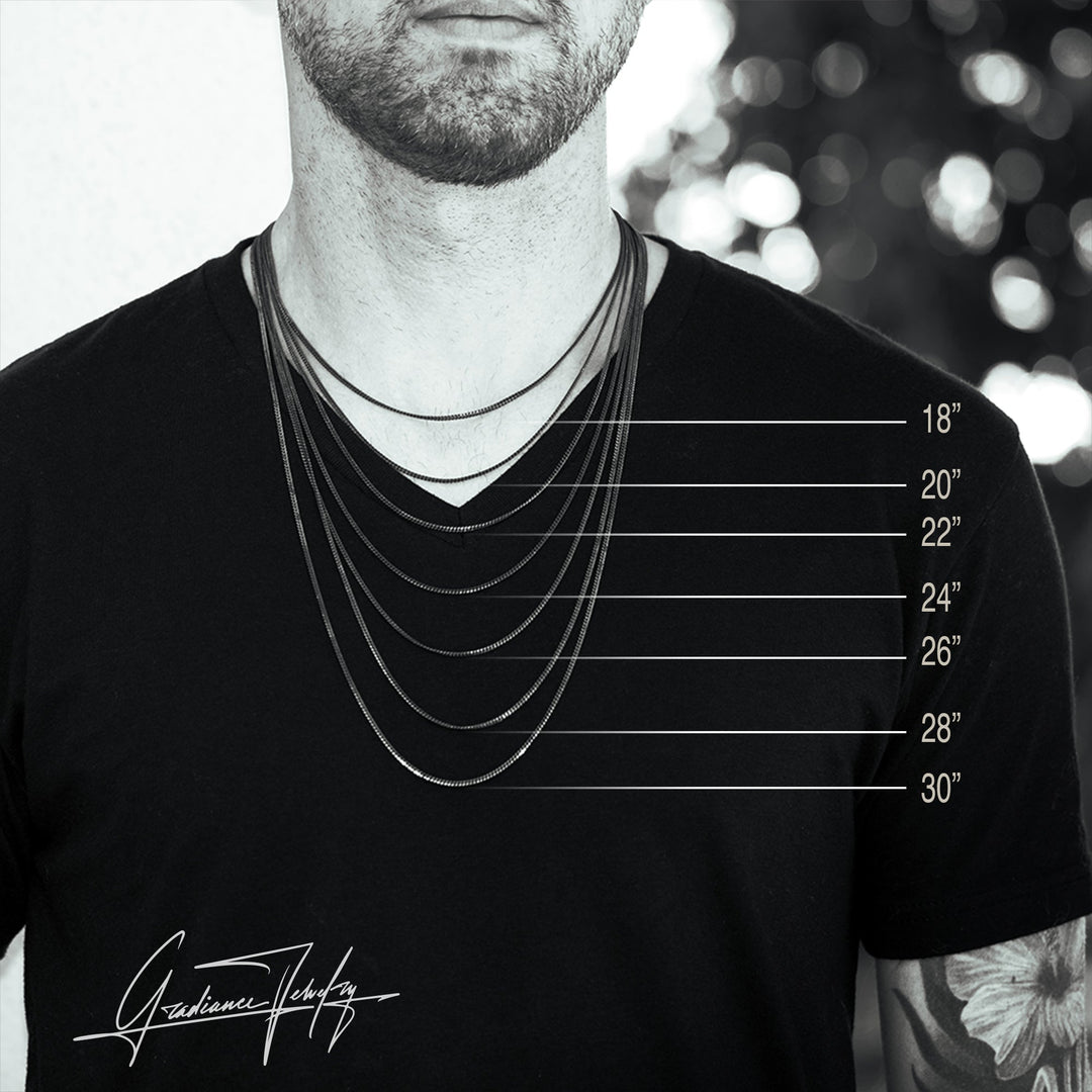 Gradiance Jewelry men's oxidized silver miami cuban chain sizes from 18" - 24" shown on a model.